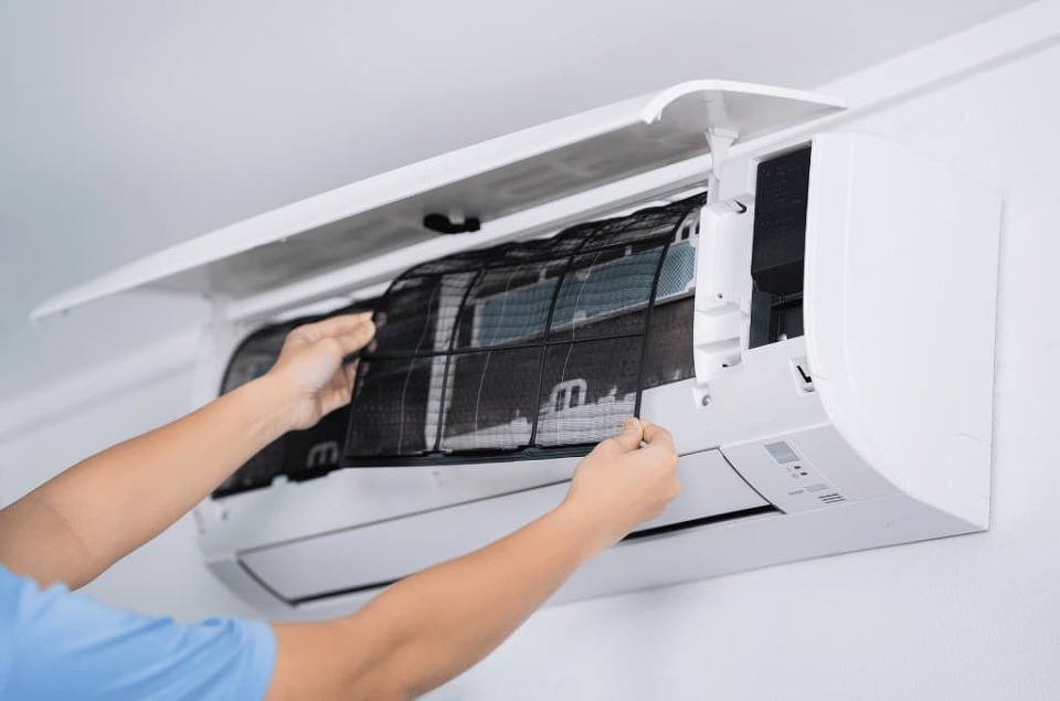 Home air conditioner cleaning service by professional staff